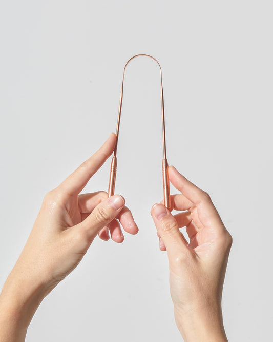 WHY A TONGUE SCRAPER IS ESSENTIAL FOR ORAL HEALTH