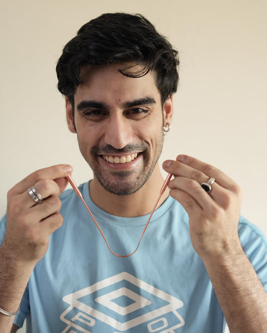 THE FIRST STEP TO BETTER DIGESTION: HOW TONGUE SCRAPING IN THE MORNING CAN PRIME YOUR GUT