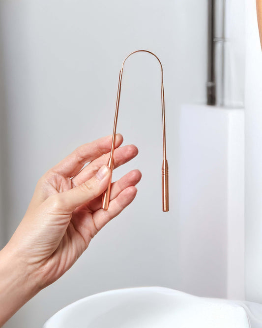 REASONS TO SCRAPE YOUR TONGUE AND HOW TO DO IT